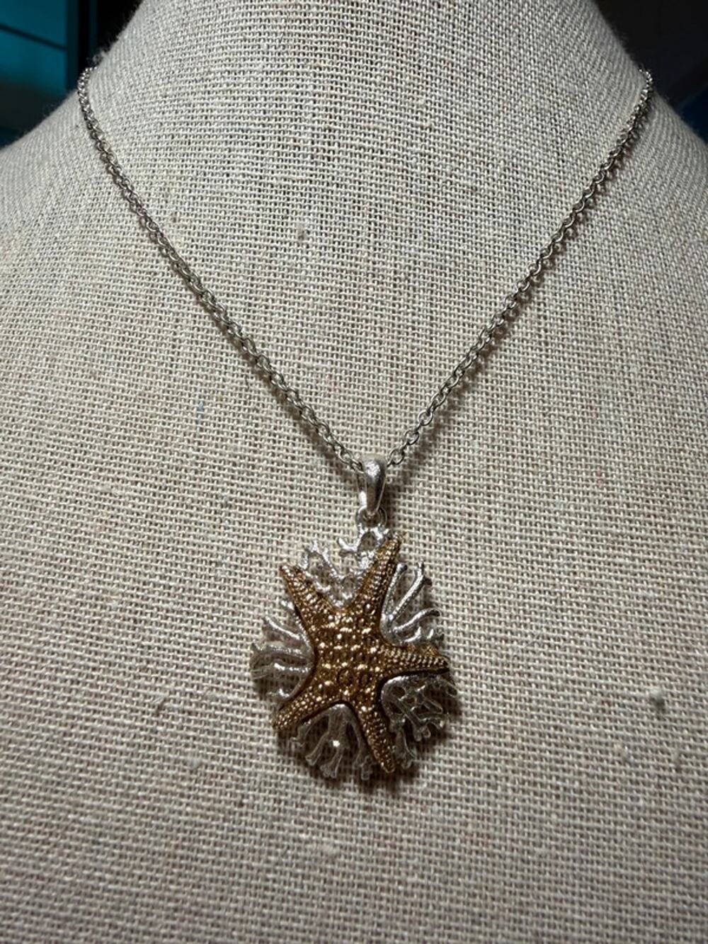 Two tone starfish and coral pendant on silver tone necklace 15-18โ